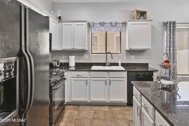 14472 S Camino Tierra Monte, Sahuarita, AZ 85629 - kitchen featuring black appliances, a sink, white cabinetry, and dark stone counters