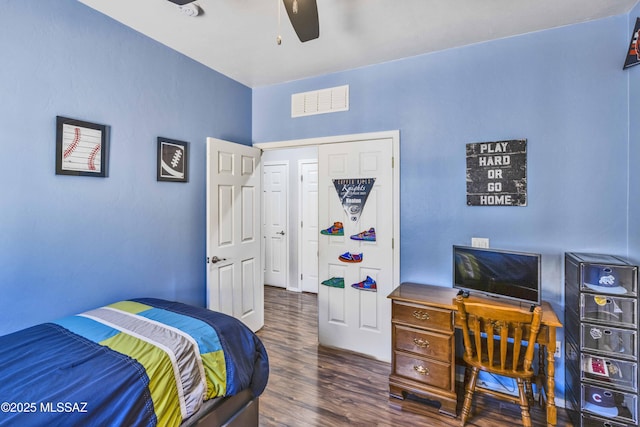 14472 S Camino Tierra Monte, Sahuarita, AZ 85629 - bedroom with wood finished floors, a desk, and ceiling fan