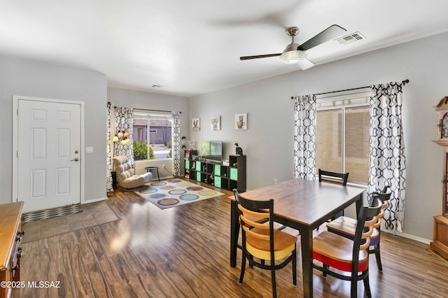 14472 S Camino Tierra Monte, Sahuarita, AZ 85629 - dining space featuring ceiling fan, wood finished floors, and baseboards
