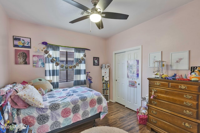 14472 S Camino Tierra Monte, Sahuarita, AZ 85629 - bedroom featuring dark wood-style floors, a ceiling fan, and a closet