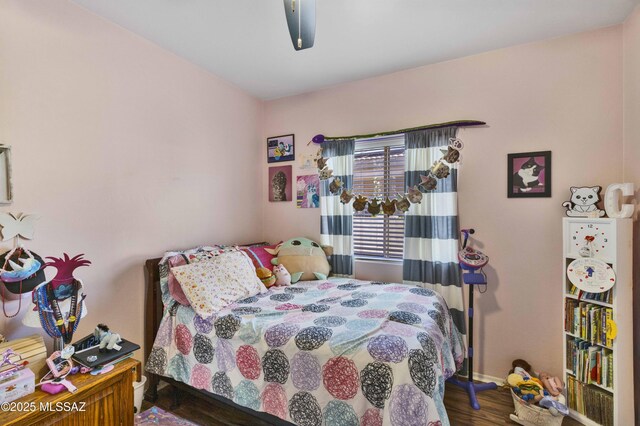 14472 S Camino Tierra Monte, Sahuarita, AZ 85629 - bedroom with wood finished floors, a ceiling fan, and baseboards