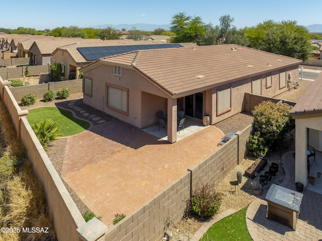 14472 S Camino Tierra Monte, Sahuarita, AZ 85629 - rear view of property featuring a patio, stucco siding, a fenced backyard, and a mountain view