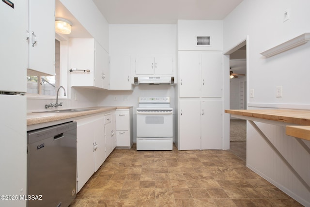 5930 E 32nd St, Tucson, AZ 85711 - kitchen featuring white appliances, under cabinet range hood, light countertops, a sink, and visible vents