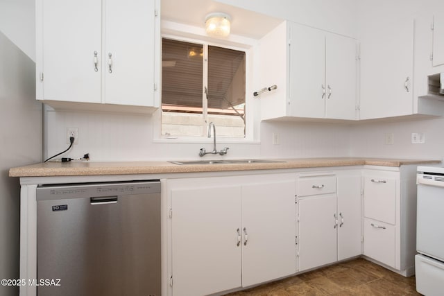 5930 E 32nd St, Tucson, AZ 85711 - kitchen with light countertops, dishwasher, white cabinets, and a sink
