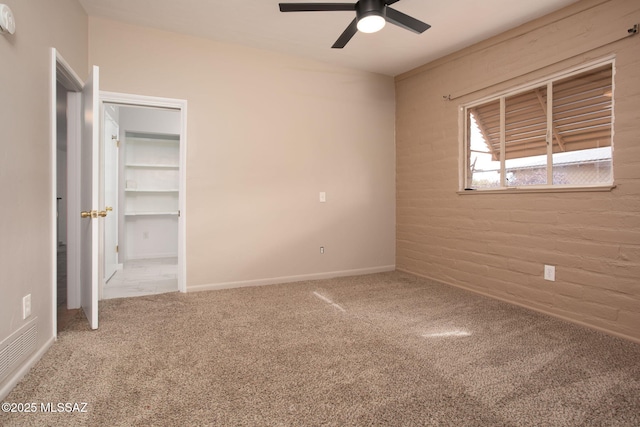 5930 E 32nd St, Tucson, AZ 85711 - unfurnished bedroom featuring baseboards, a ceiling fan, and carpet floors