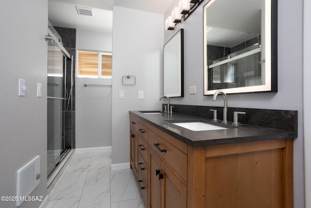 5930 E 32nd St, Tucson, AZ 85711 - bathroom featuring marble finish floor, a sink, and visible vents