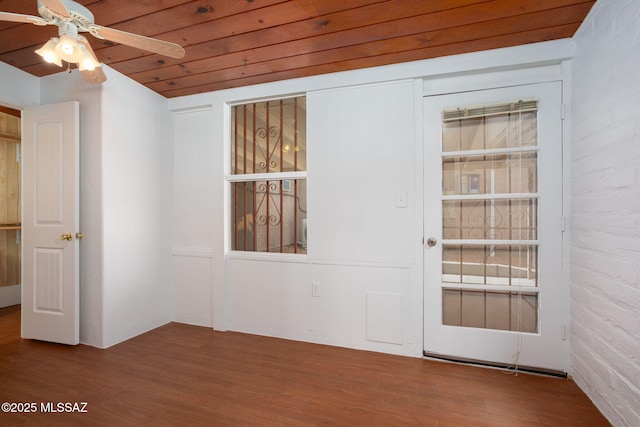 5930 E 32nd St, Tucson, AZ 85711 - empty room with a ceiling fan and wood finished floors