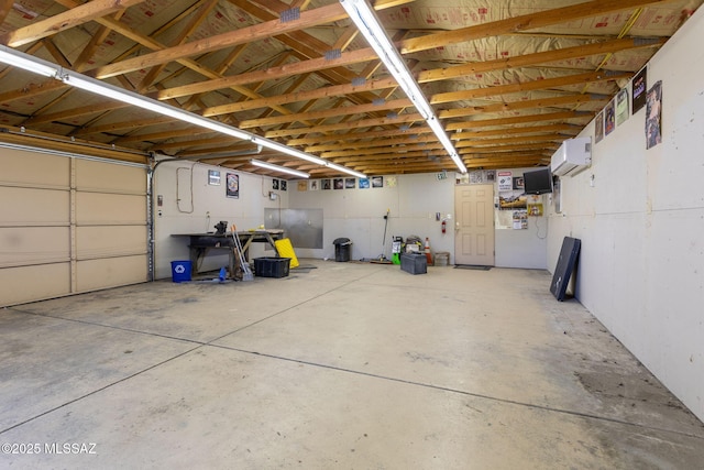 5930 E 32nd St, Tucson, AZ 85711 - garage featuring an AC wall unit