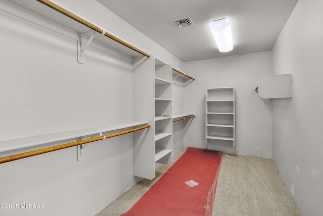 walk in closet featuring visible vents