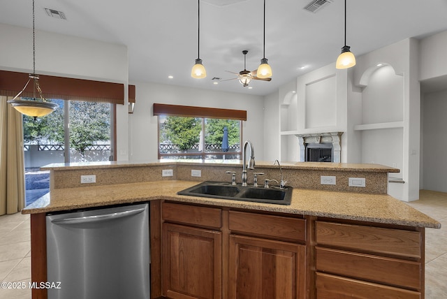 kitchen with ceiling fan, a sink, dishwasher, open floor plan, and visible vents