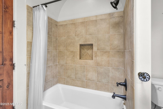 bathroom with toilet and shower / bathtub combination with curtain