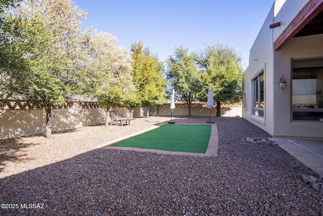 view of yard featuring a fenced backyard