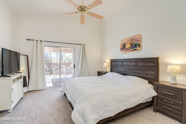 bedroom with a ceiling fan, light colored carpet, lofted ceiling, and access to exterior