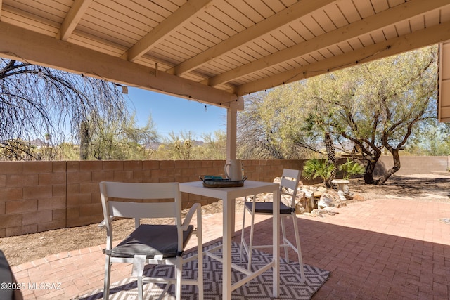 view of patio / terrace with a fenced backyard and outdoor dining space