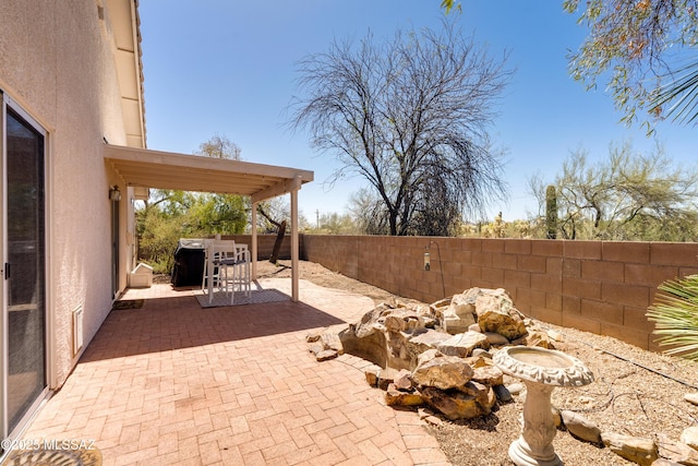 view of patio with a fenced backyard