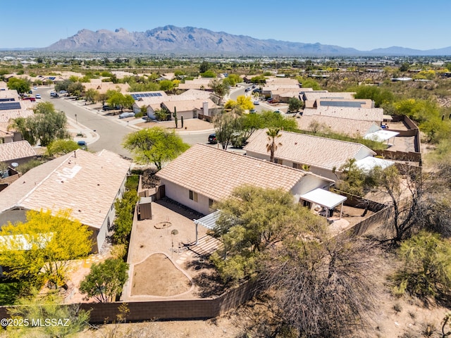 drone / aerial view with a mountain view and a residential view