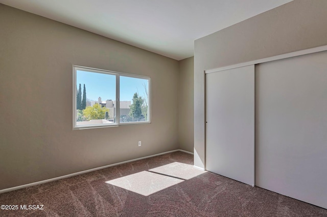 9290 N Jessy Ln, Tucson, AZ 85742 - unfurnished bedroom with a closet and carpet