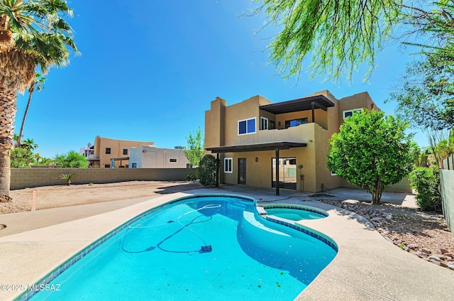 9290 N Jessy Ln, Tucson, AZ 85742 - view of pool with a pool with connected hot tub, a patio, and a fenced backyard