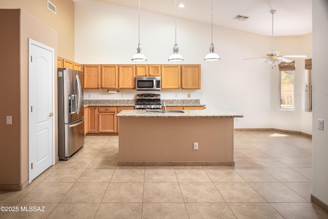 2377 W Catalina View Dr, Tucson, AZ 85742 - kitchen with stainless steel appliances, high vaulted ceiling, a sink, light stone countertops, and light tile patterned flooring