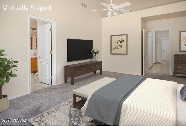 2377 W Catalina View Dr, Tucson, AZ 85742 - bedroom featuring carpet flooring, baseboards, and ensuite bath