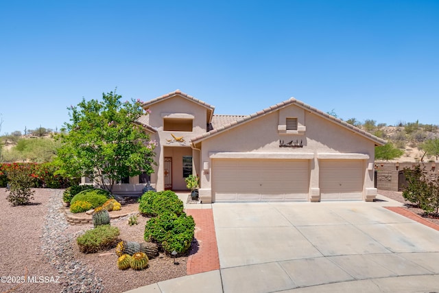 2377 W Catalina View Dr, Tucson, AZ 85742 - view of front of home featuring stucco siding, driveway, a garage, and a tiled roof