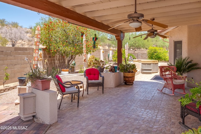 2377 W Catalina View Dr, Tucson, AZ 85742 - view of patio / terrace with a hot tub, a fenced backyard, and ceiling fan
