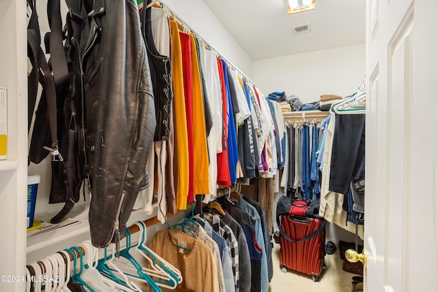 walk in closet featuring visible vents