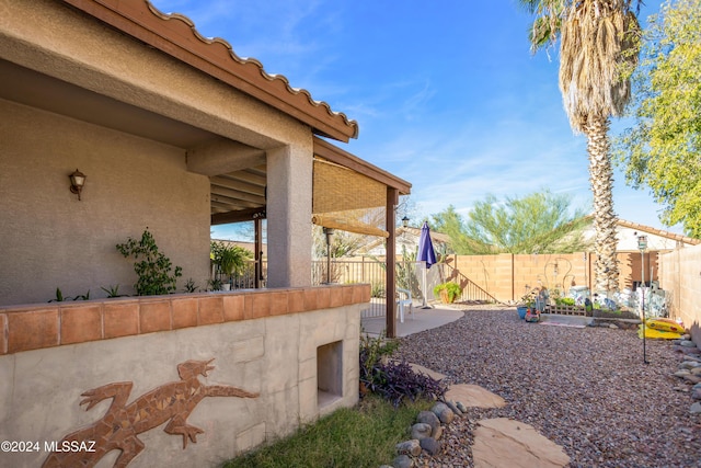 view of yard featuring a fenced backyard and a patio area