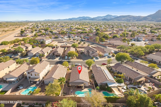 aerial view with a mountain view and a residential view