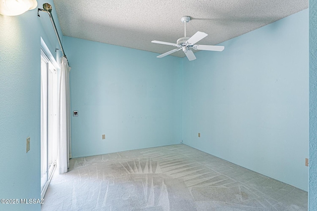 2778 S Via Del Bac, Green Valley, AZ 85622 - empty room with a textured ceiling, ceiling fan, and carpet flooring