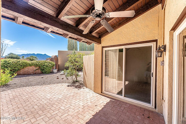2778 S Via Del Bac, Green Valley, AZ 85622 - view of patio featuring a ceiling fan, a mountain view, and a fenced backyard
