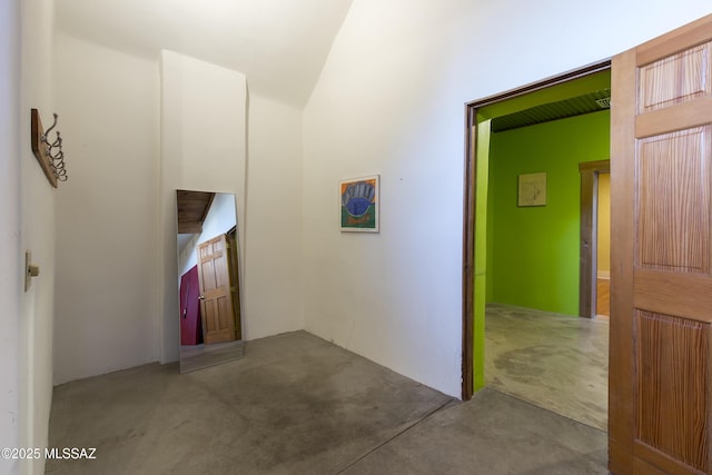 hallway featuring concrete floors