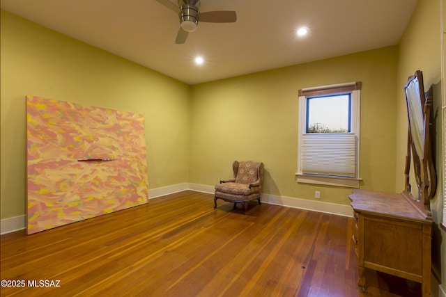 unfurnished room with wood-type flooring, recessed lighting, ceiling fan, and baseboards