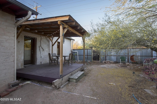 view of yard with fence and a wooden deck