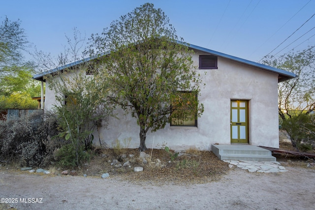 view of front of house with stucco siding