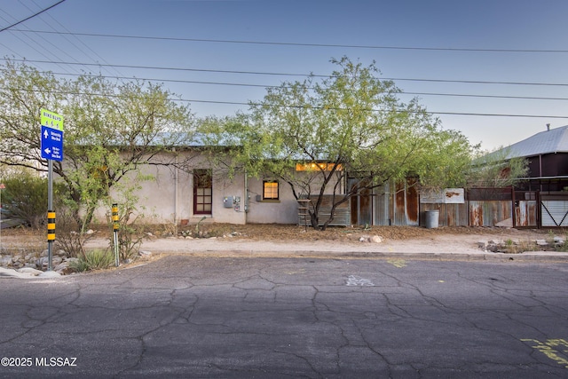 view of front of home featuring stucco siding