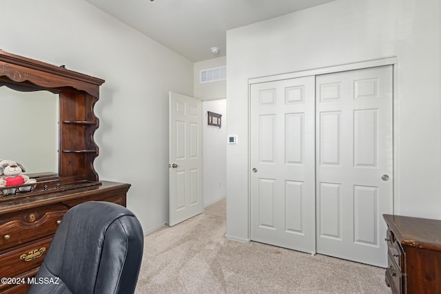 office area with light colored carpet and visible vents