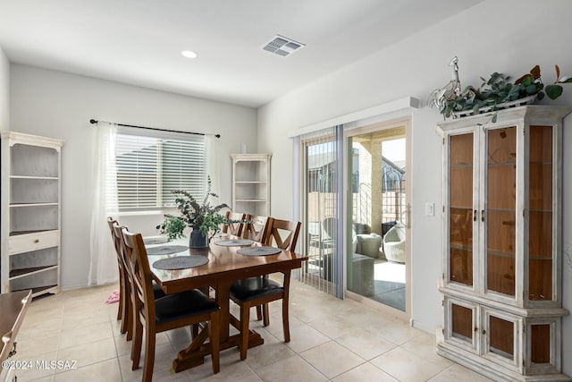 dining area featuring light tile patterned flooring, visible vents, french doors, and recessed lighting