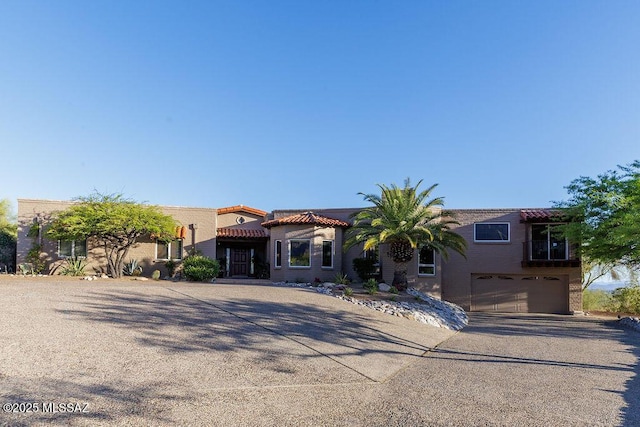 5310 N Calle Bujia, Tucson, AZ 85718 - mediterranean / spanish house with driveway and a garage