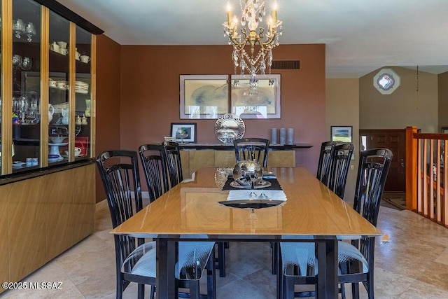 5310 N Calle Bujia, Tucson, AZ 85718 - dining area featuring a chandelier
