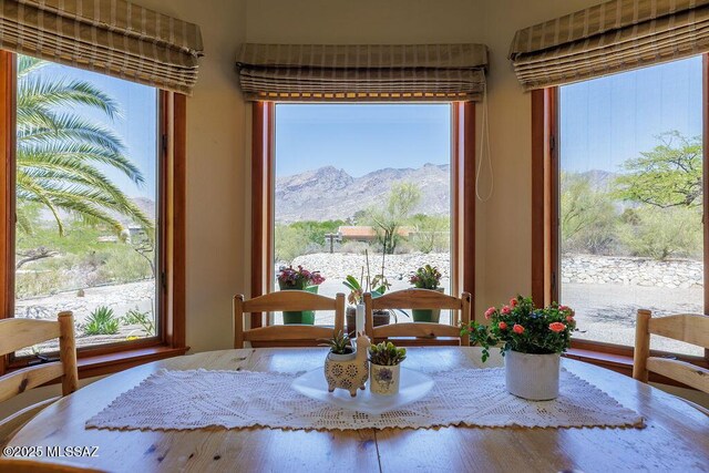 5310 N Calle Bujia, Tucson, AZ 85718 - dining room with a mountain view and wood finished floors