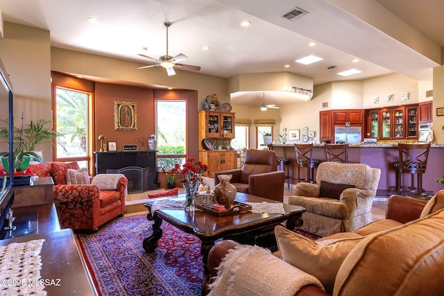 5310 N Calle Bujia, Tucson, AZ 85718 - living area with a ceiling fan, plenty of natural light, wood finished floors, and recessed lighting