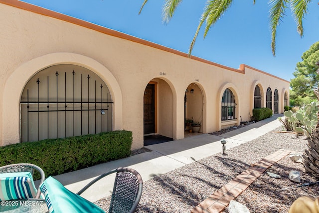 exterior space with stucco siding