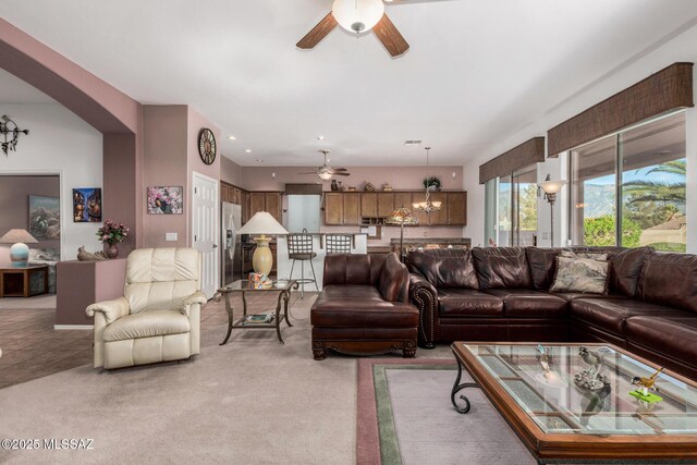 60621 E Eagle Heights Dr, Tucson, AZ 85739 - living room featuring light colored carpet and ceiling fan