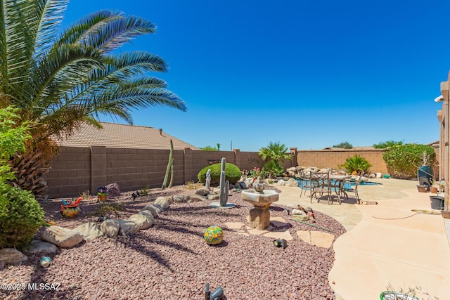 60621 E Eagle Heights Dr, Tucson, AZ 85739 - view of swimming pool featuring a fenced in pool, a hot tub, a patio area, and fence