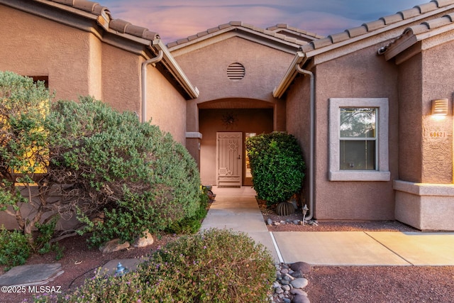60621 E Eagle Heights Dr, Tucson, AZ 85739 - view of exterior entry with stucco siding