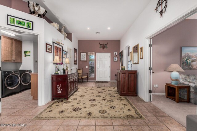 60621 E Eagle Heights Dr, Tucson, AZ 85739 - foyer entrance featuring recessed lighting, washer and clothes dryer, and light tile patterned floors