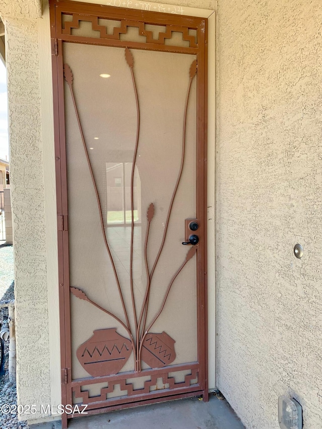 details featuring stucco siding