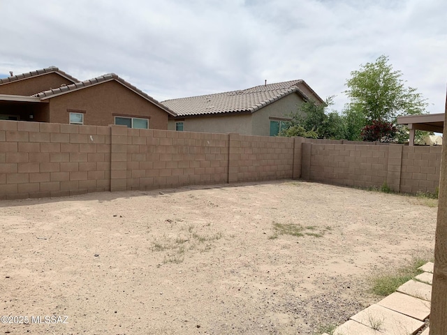 view of yard with fence