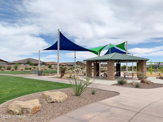 view of community featuring a gazebo and a yard